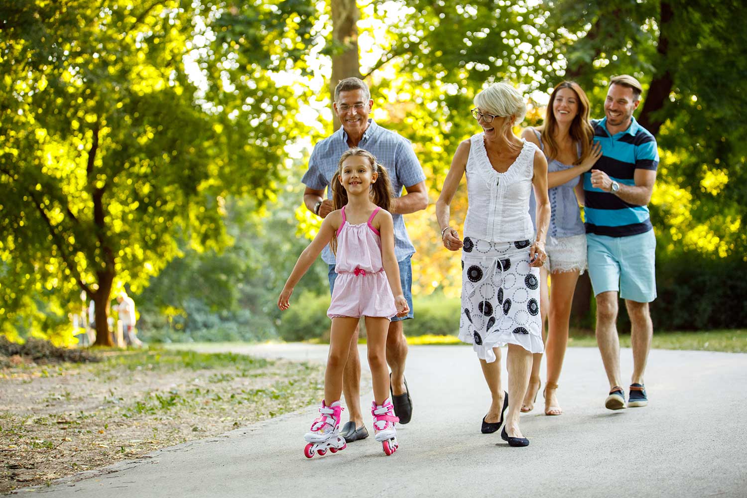 Family enjoying a walk in the park